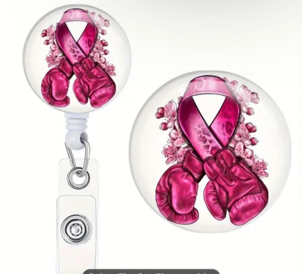 Retractable badge for breast cancer awareness.
